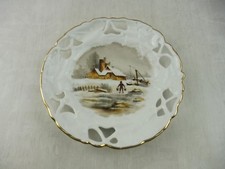Ancienne assiette ajourée en