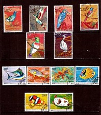 ZY2566 COMORES 2séries 12timbres: oiseaux exotiques et poissons de mer 