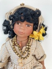 poupée métisse en porcelaine