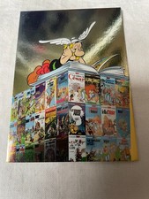 sticker image PANINI Astérix 65 ans d’aventures 2024 carte Astérix pile d'albums