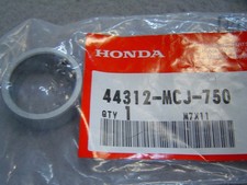 Entretoise sur axe de roue