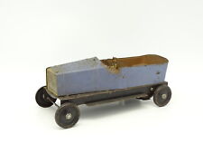 Sheet metal toy - torpedo car with driver