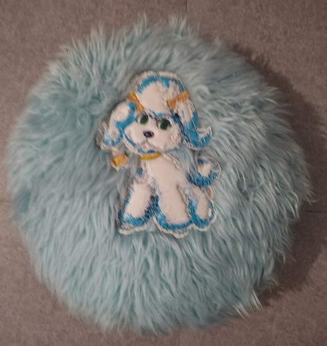 Coussin bleu rond effet fausse