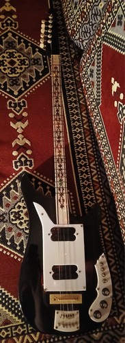 Guitar style electric saz - style,