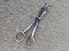 ANCIENNE PINCE A SUCRE COUPE