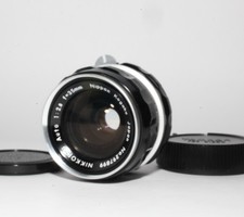 Comme neuf objectif grand - [n, neuf]