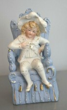  Figurine Enfant sur Trône