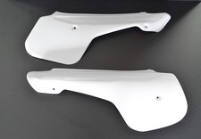 Plaques latérales Husqvarna