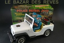 TN  NOMURA. JEEP POLICE.  + Boite.