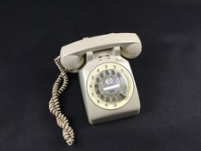 Ancien téléphone fixe à cadran rotatif vintage rétro 70