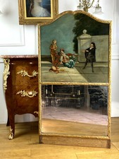 TRUMEAU DU XVIIIe AVEC UNE PEINTURE D UNE SCENE ANIMÉE ET SA GLACE AU MERCURE 
