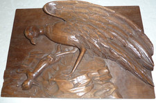 beautiful high relief furniture item featuring an eagle hunting a rabbit, decor!