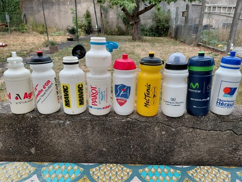 Lot 9 bidons de - 9,