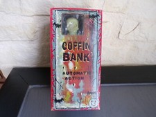 Antique Japan Mechanical Piggy Bank Sheet Metal Toy Automatic Coffin Bank