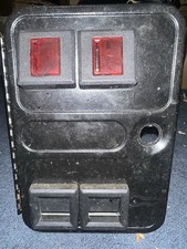 Arcade video game over under top coin door  Only with coin mechanisms.