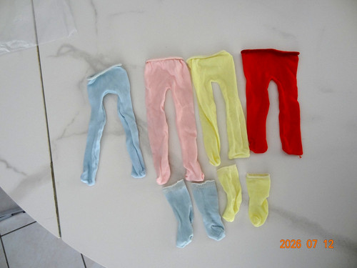 Lot vintage collants poupée