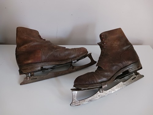 Ancienne paire patin a - paire,
