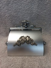 Toilet reel with metal ornament..1490