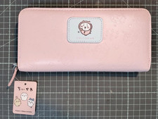 sac à main portefeuille badge