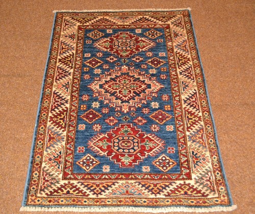 Tapis oriental fait main - fait,