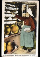 in NORMANDY / WOMAN dressed with her DISHWASHER