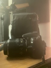 nikon d3000 camera, lens and