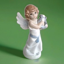 figurine angelot  en porcelaine allemande