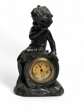 Horloge réveil en composition enfant signé Deblanc fin XIXème