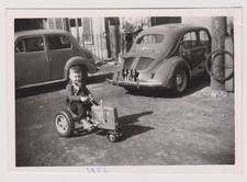 old photo ?️ child tractor toy 1952 cars background