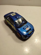 SCALEXTRIC/HORNBY VOITURE CIRCUIT 1/32 SUBARU IMPREZA N° 10 MAKINEN  FONCTIONNE