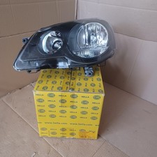 phare gauche (fond noir) VW Polo IV 2002-2010 Hella