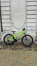 velo rockrider VTT jaune fluo