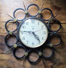 Vintage: Belle horloge murale VEDETTE forme Soleil fer forgé Pendule  C49