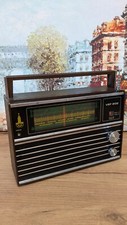Vintage transistor radio VEF-202 brown case Olympic Edition with FM (1980, USSR)