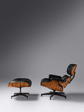 A Rosewood Mid-century modern Eames lounge chair and ottoman 670 and 671