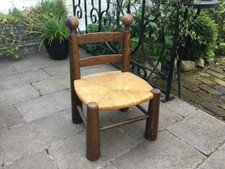 Chaise basse de cheminée