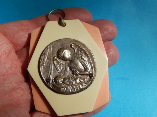 Médaille berceau ange - de,
