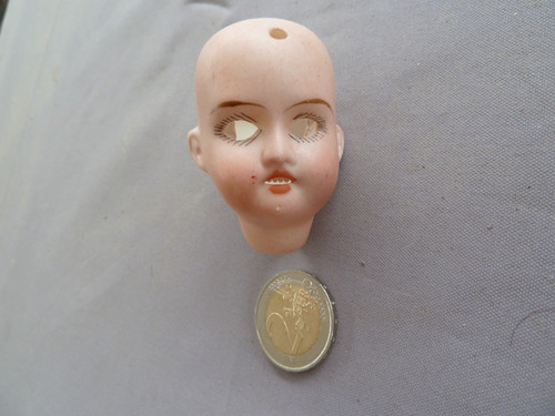 Ancienne petite tête - , de