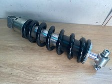 UN D AMORTISSEUR ARRIERE 13500