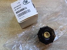 UN BOUCHON DE RADIATEUR NEUF