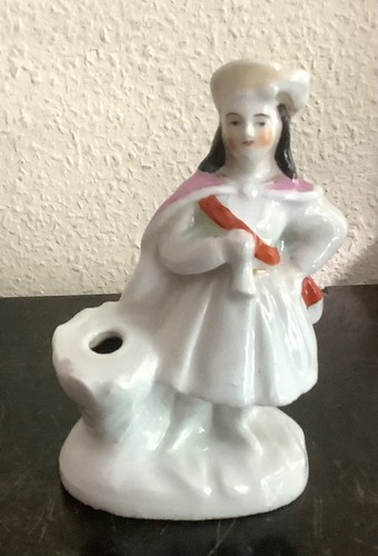 Statuette pique plume en - pique,