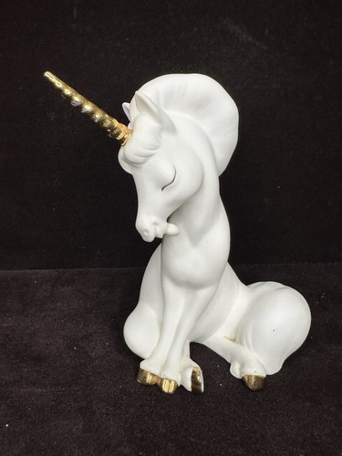 Unicorn sitting figurine - unicorn,