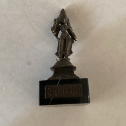 Statue figurine métal - , sur