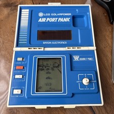 Jeu BANDAI LCD  SOLARPOWER Air Port Panic RARE - (époque Game & Watch)