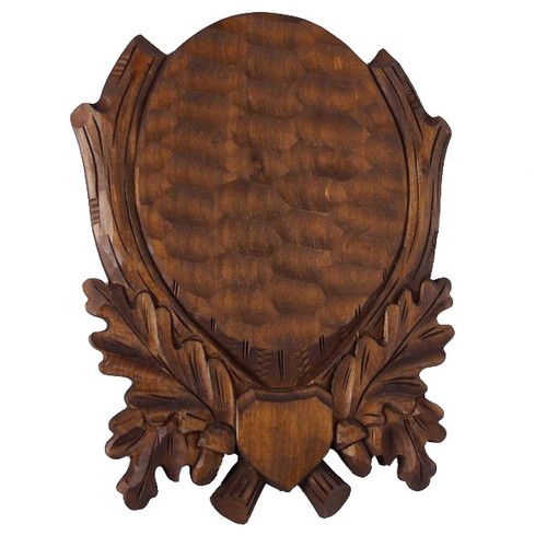 Plaque trophée sculptée - de,