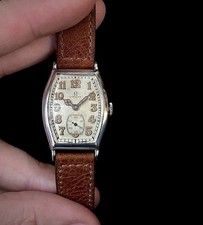1930s Omega Silver cased Art Deco tonneau watch German market Arabic numerals