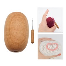 Oeuf à repriser avec aiguille