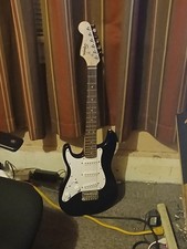 Squier Mini Stratocaster Left Handed Electric Guitar, Maple Neck, Gloss Black