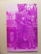 Old postcard - FANCY - Happy New Year - Young couple and their child in a chair.