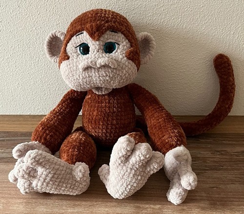 Mignon petit singe brun - , au